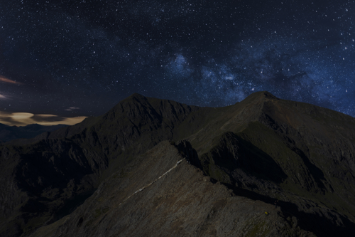 Snowdonia Crib Goch ridge and Mount Snowdon at night, Wales, UK